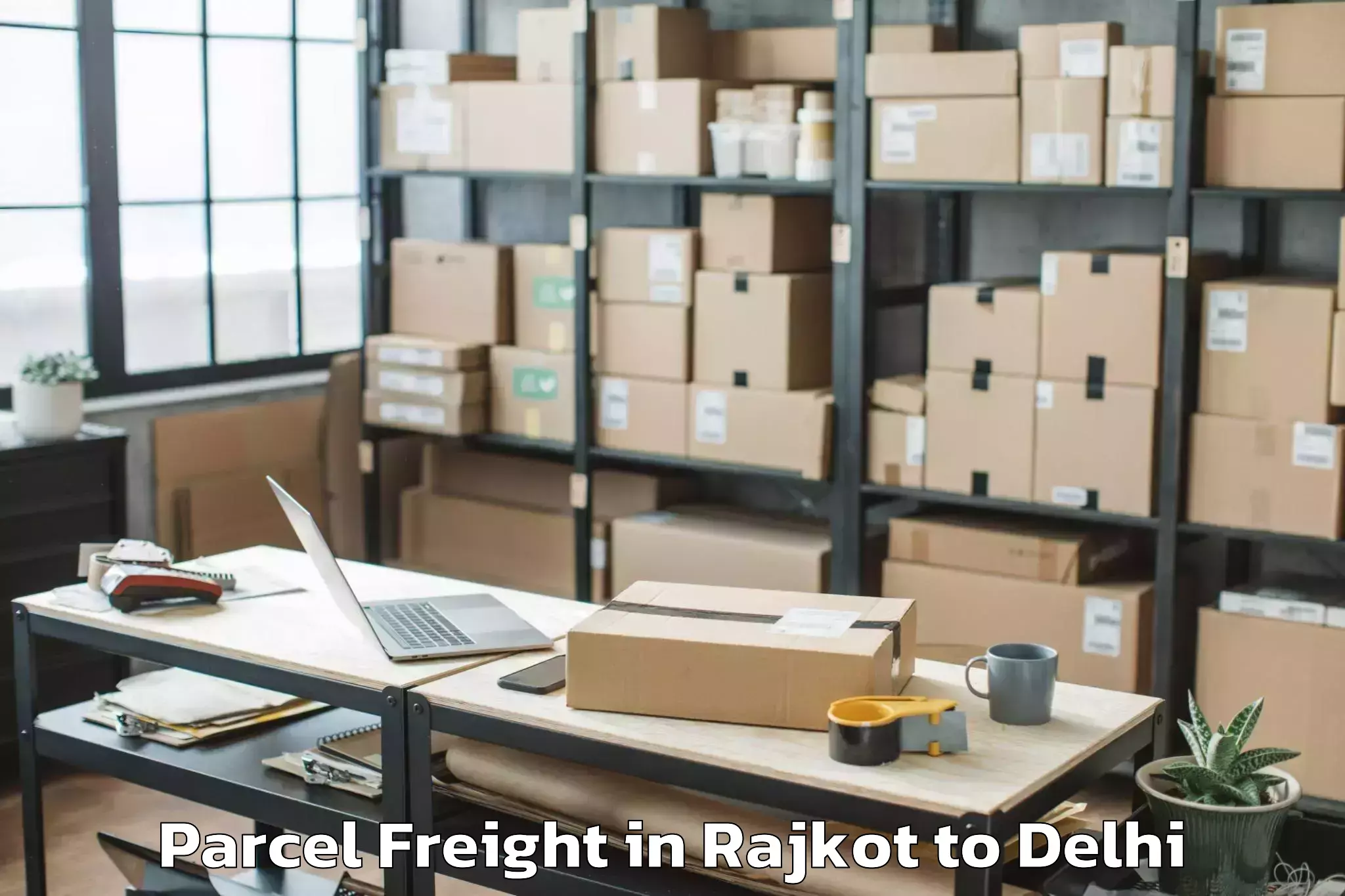 Book Rajkot to Garhi Parcel Freight